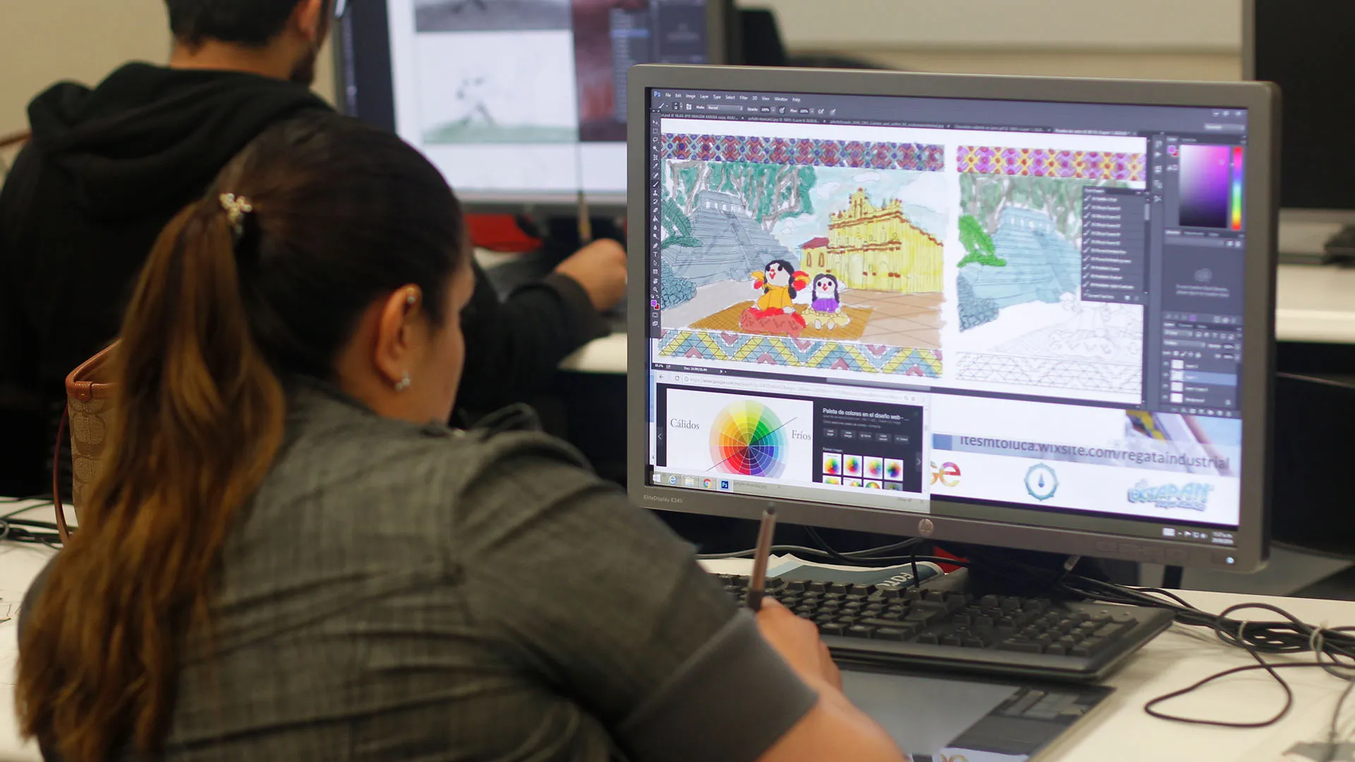 student working visual aspects on a multimedia project