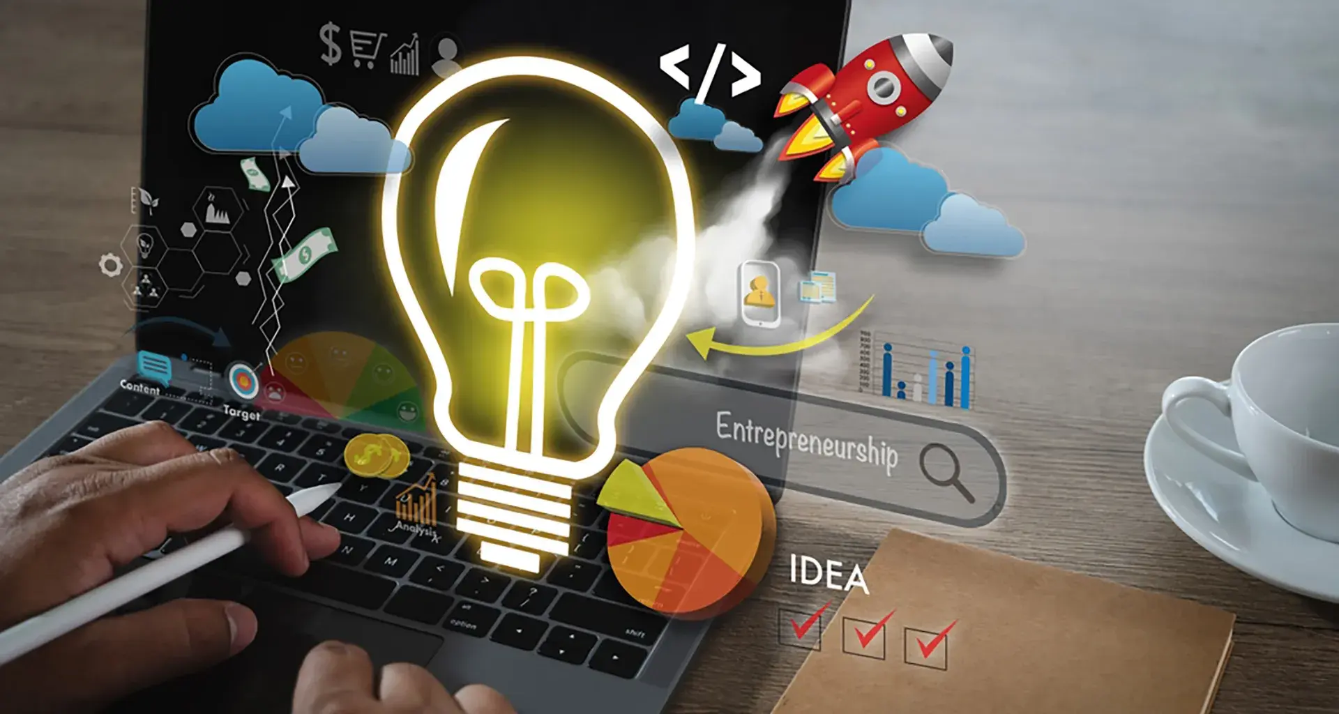 fotografía de una computadora con ilustraciones de bombilla de luz, cohete, ideas