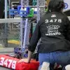 Integrante LamBot con el robot