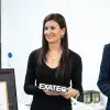 Karla Natividad recibiendo el Premio al Mérito EXATEC