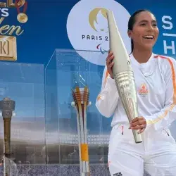 On fire! Diana Flores takes part in Olympic torch relay