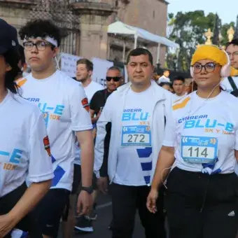 Corredores preparandose para iniciar
